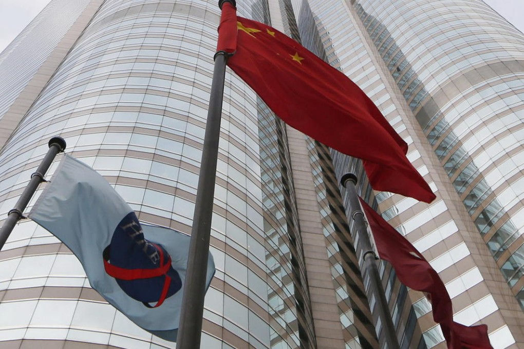 Vacancies linger in Exchange Square, although it is attracting mainland firms such as China Securities International. Photo: AP