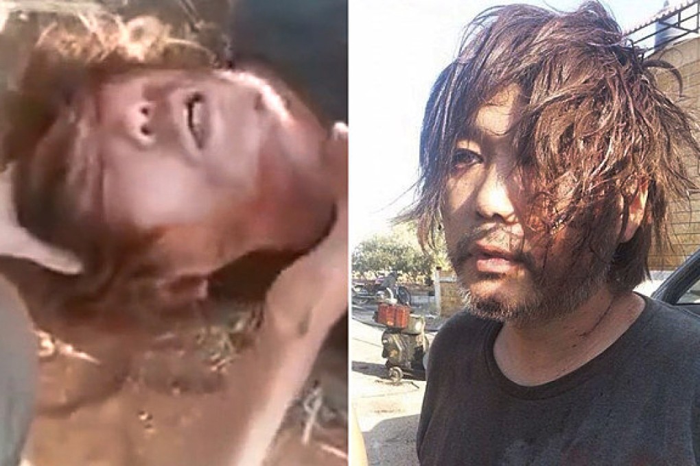 Screenshot from a video clip posted on YouTube that showed a man lying on the ground being questioned by unidentified persons and responding that he was Japanese and that his name was Haruna Yukawa. Photo: SCMP Pictures