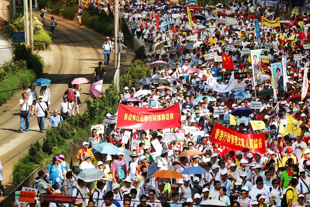 Some of the crowd during yesterday's march against the Occupy Central movement. Police said 111,000 people took part although other estimates varied. Photo: K.Y. Cheng