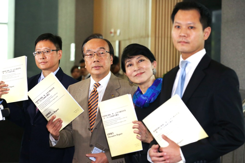 Civic Party lawmakers including Alan Leong Kah-kit (second left) brought copies of their alternative report on political reform to the meeting on Tuesday. Photo: Nora Tam