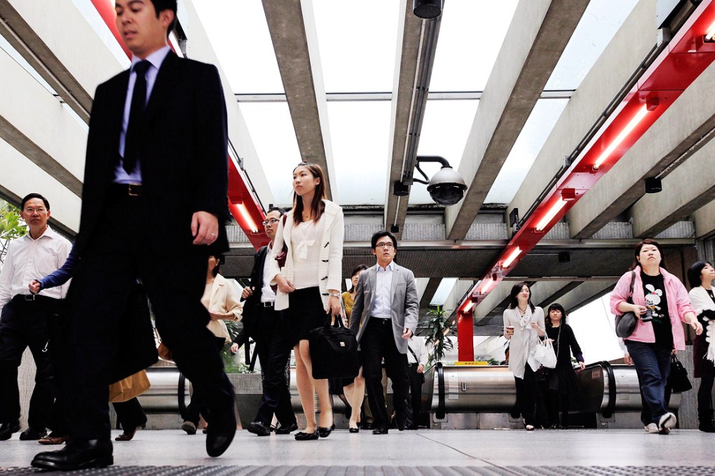 Analysts are taking a less-optimistic view of Hong Kong's economic prospects in the second half of this year after the government lowered its forecasts. Photo: Bloomberg