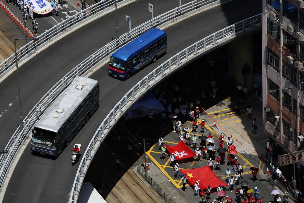 Sunday's anti-Occupy Central march was marred by stories of protesters receiving payment or gifts. Photo: AP