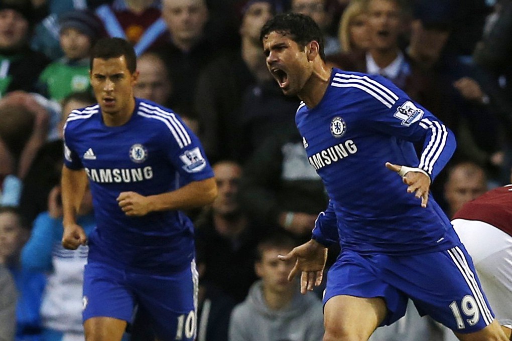 Diego Costa celebrates his goal. Photo: Reuters