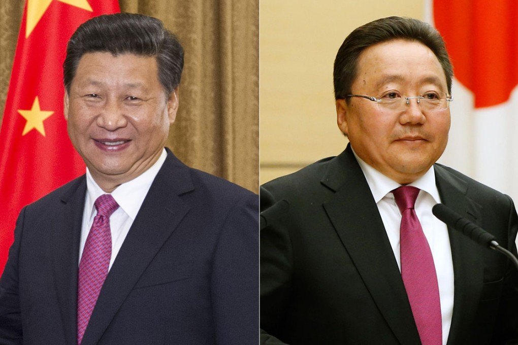 China President Xi Jinping (left) and Mongolian President Tsakhia Elbegdorj. Dialogue between China and Mongolia has expanded in recent months. Photos: AFP