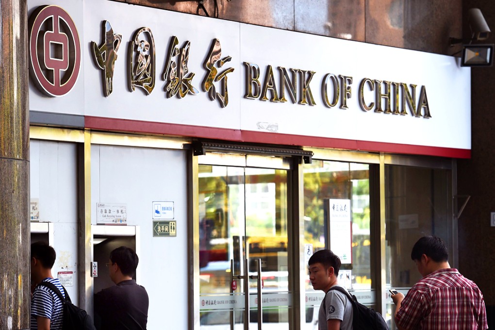 At BOC Hong Kong (Holdings), which is majority owned by Bank of China, profit attributable to equity holders grew 7.4 per cent from a year earlier to HK$12.08 billion. Photo: AFP