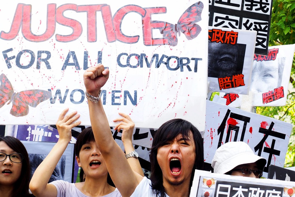 Taiwanese hold a protest demanding that Japan apologises and compensate women who were forced to work as sex slaves for the Japanese army during World War II. Photo: EPA