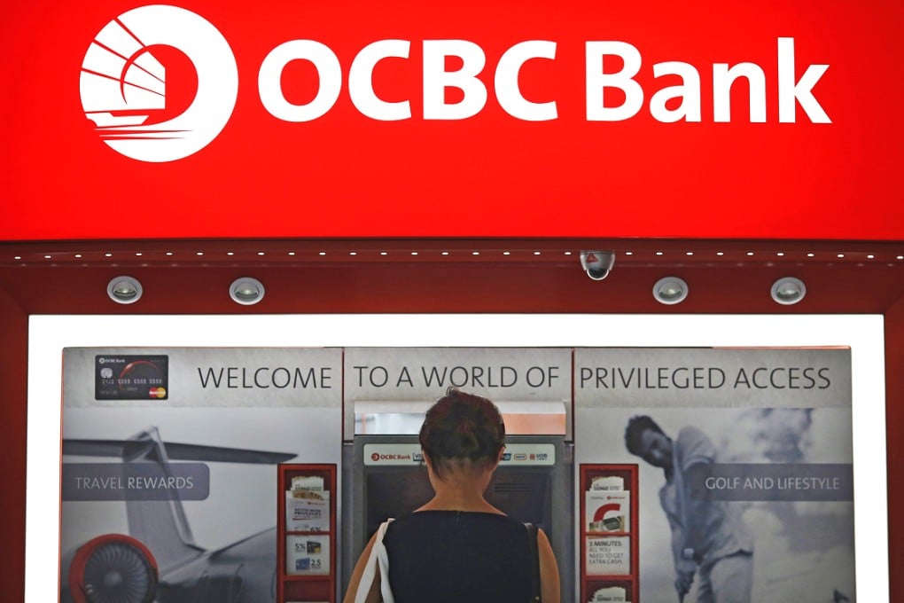 The bank’s new logo, which incorporates OCBC’s Chinese sailing vessel, will be used at all branches and ATMs in Hong Kong and Macau, as well as on its digital platform. Photo: Reuters