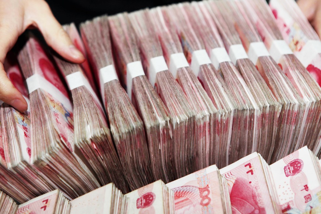July's trade value settled in yuan fell to 498.4 billion yuan (HK$626.6 billion), down 12 per cent from a month earlier, according to the People's Bank of China. Photo: AFP