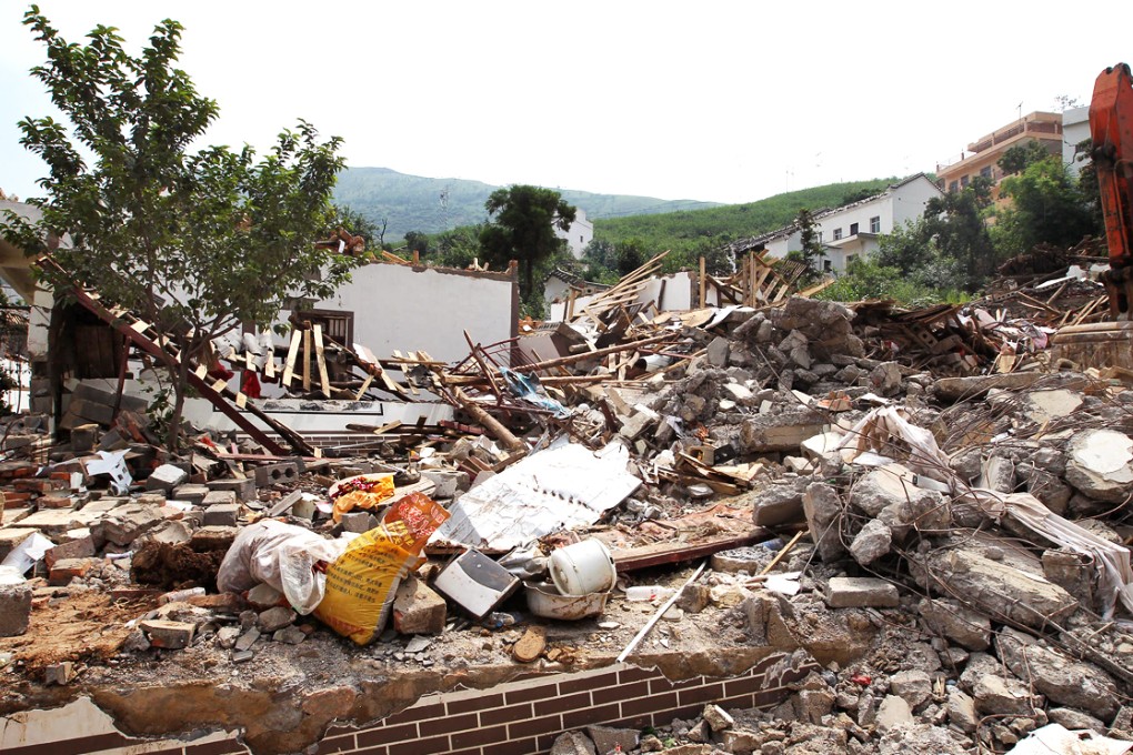 The remains of Cao Zhengxian's home in Luomakou - at the epicentre of the devastating Yunnan earthquake. Cao lost two of her three children, as well as three grandchildren. Photo: Simon Song