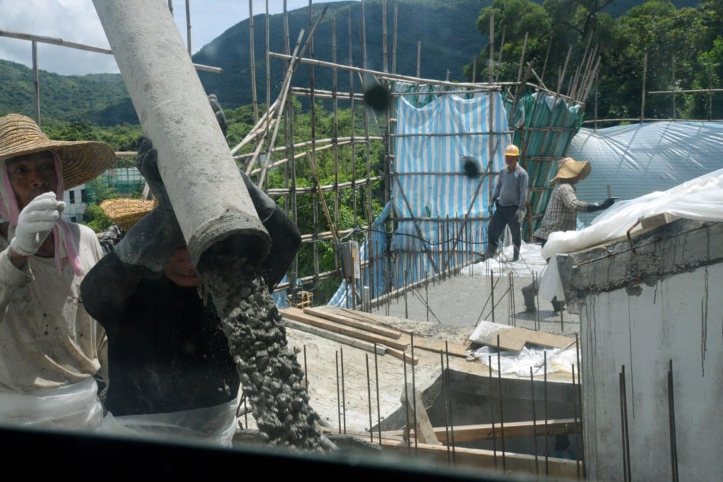 Builder at work on the construction site. Photo: SCMP Pictures