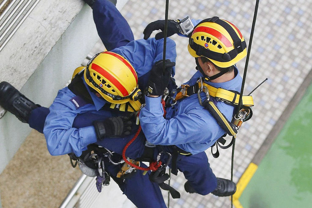 High Angle Rescue Team members in action at the Fire Services Department's West Kowloon training centre. Photo: K.Y. Cheng