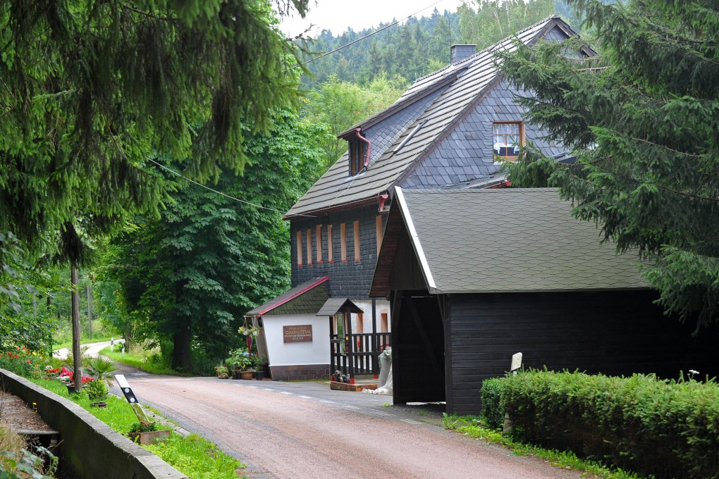 The Gimmlitztal pension in Reichenau, eastern Germany, where the German police officer allegedly killed a volunteer he met on a website for cannibalism fetishists. Photo: AFP