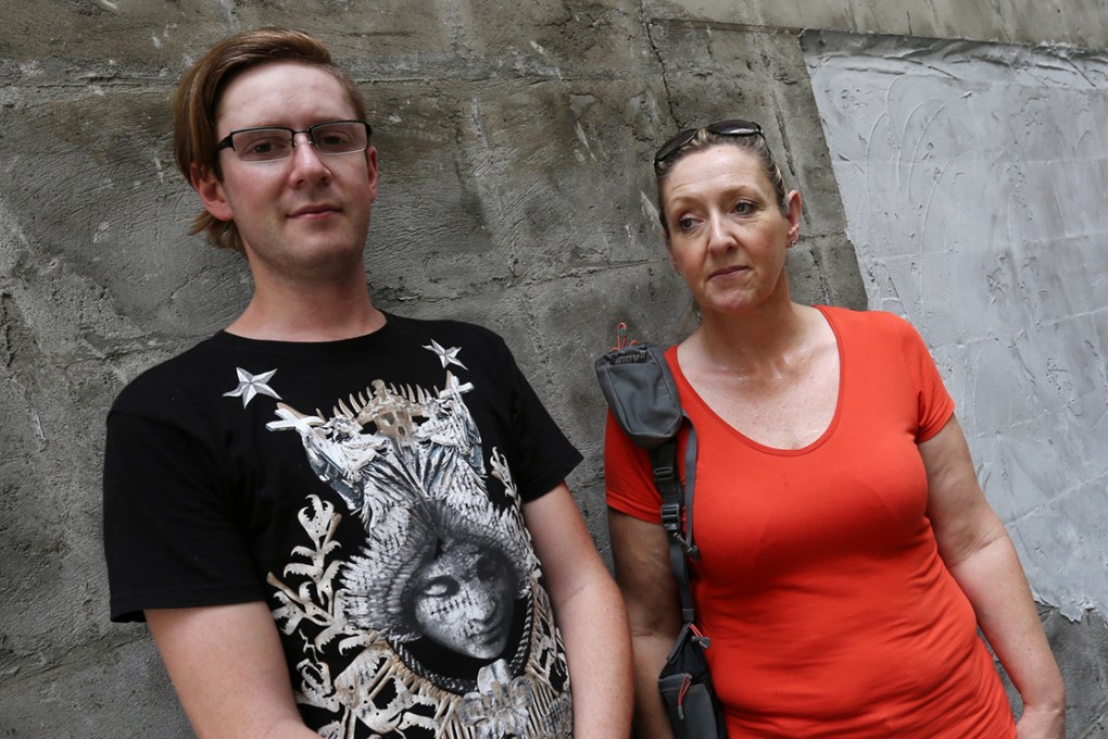 Helen Hughes, with her son Peter, hopes to take her younger son Robert to the UK for treatment for schizophrenia. Photo: Jonathan Wong