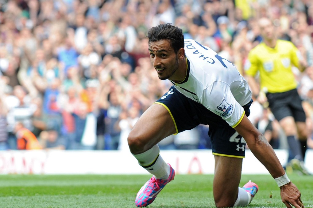 Tottenham Hotspur's Belgian midfielder Nacer Chadli celebrates scoring his second goal against QPR on Sunday. Photo: AFP