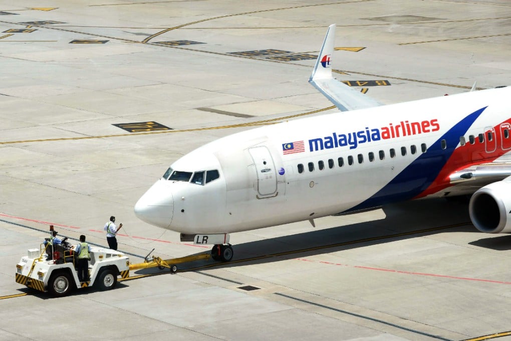 A Malaysia Airlines jet at Kuala Lumpur International airport. The Tokyo-bound flight was 50 minutes into its journey when it was forced to return to the airport, according to reports. Photo: AFP