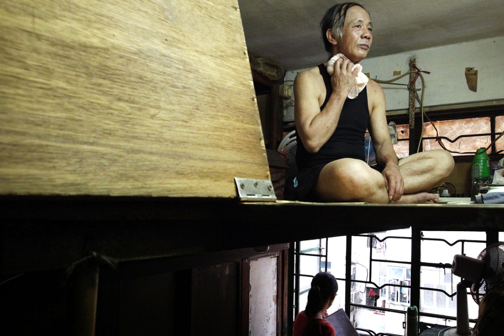 People in their subdivided flats in Sham Shui Po. Photo: May Tse