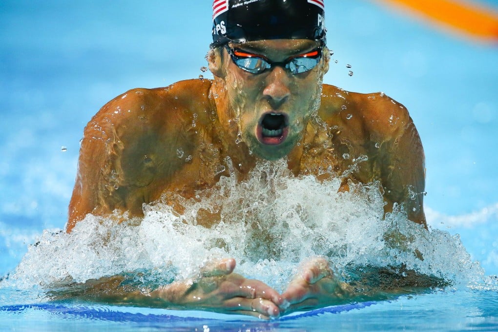 Michael Phelps swims the breaststroke leg in the 200m individual medley. Photo: AFP