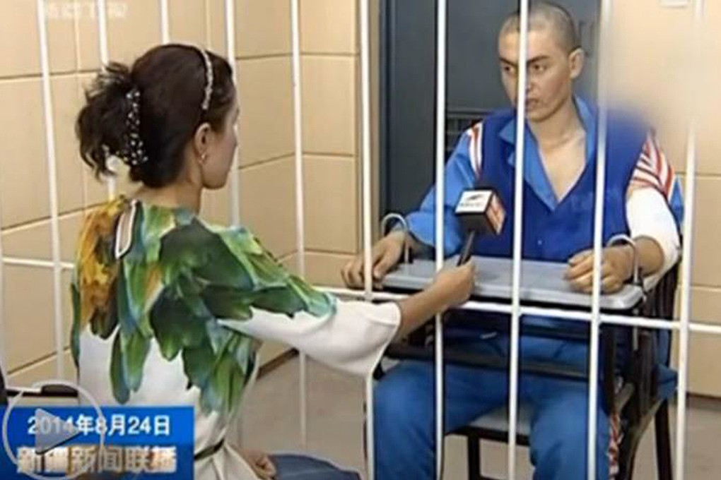 Nurmemet Abidilimit being interviewed on Xinjiang Television. Photo: SCMP Pictures