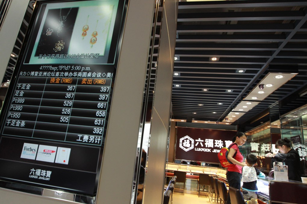 Luk Fook's jewellery shops are seeing more tourists from smaller mainland cities with less purchasing power. Photo: May Tse