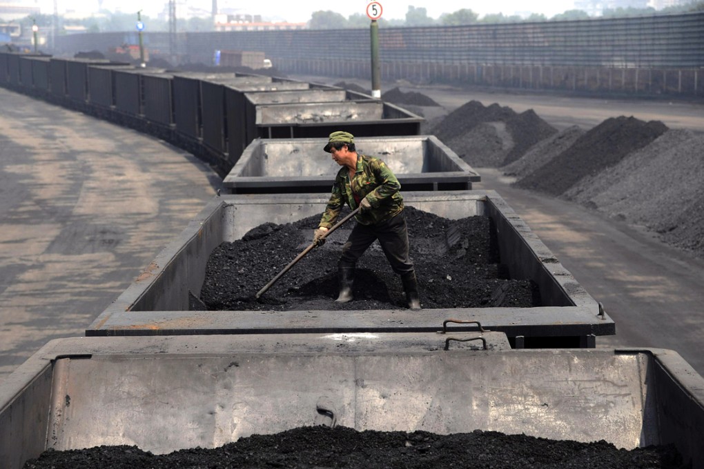 China Shenhua Energy will cut its coal sales ant output targets. Photo: AP