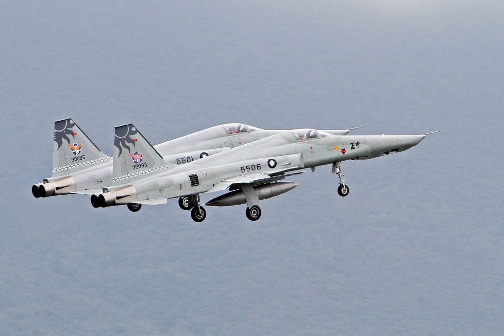 Two RF-5 jets take off from an airbase in Taiwan's eastern Hualien city. Taiwan officials said they scrambled Mirage jets after several mainland Y-8 planes flew over their ADIZ in the South China Sea. Photo: AFP