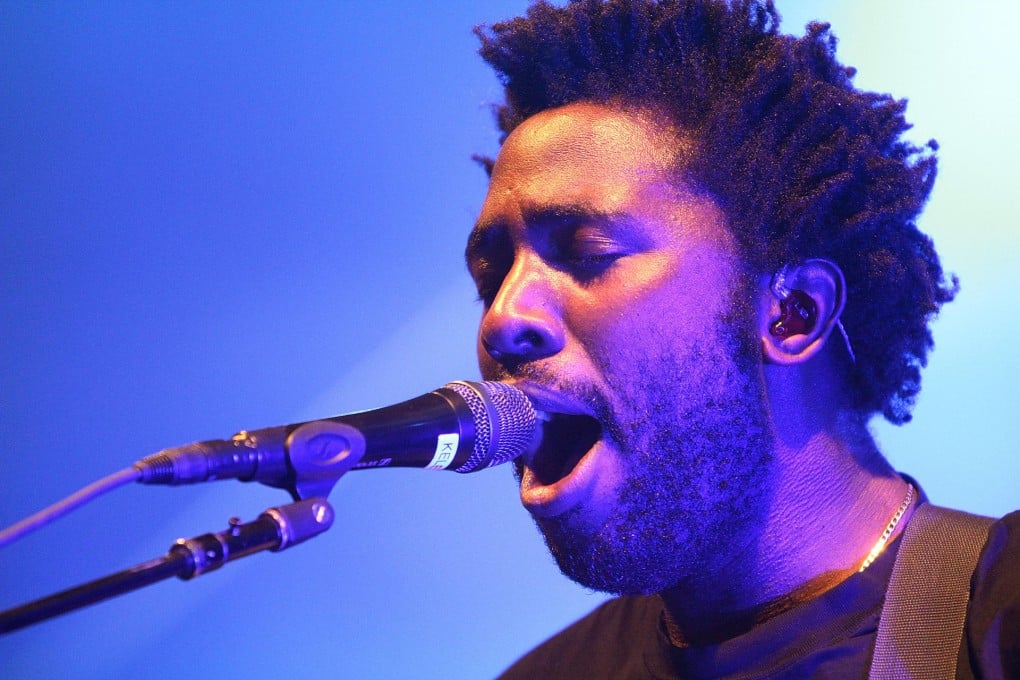 Kele Okereke on stage at the Governor's Ball Music Festival in Manhattan, New York. Photos: Andrew Benge, Corbis