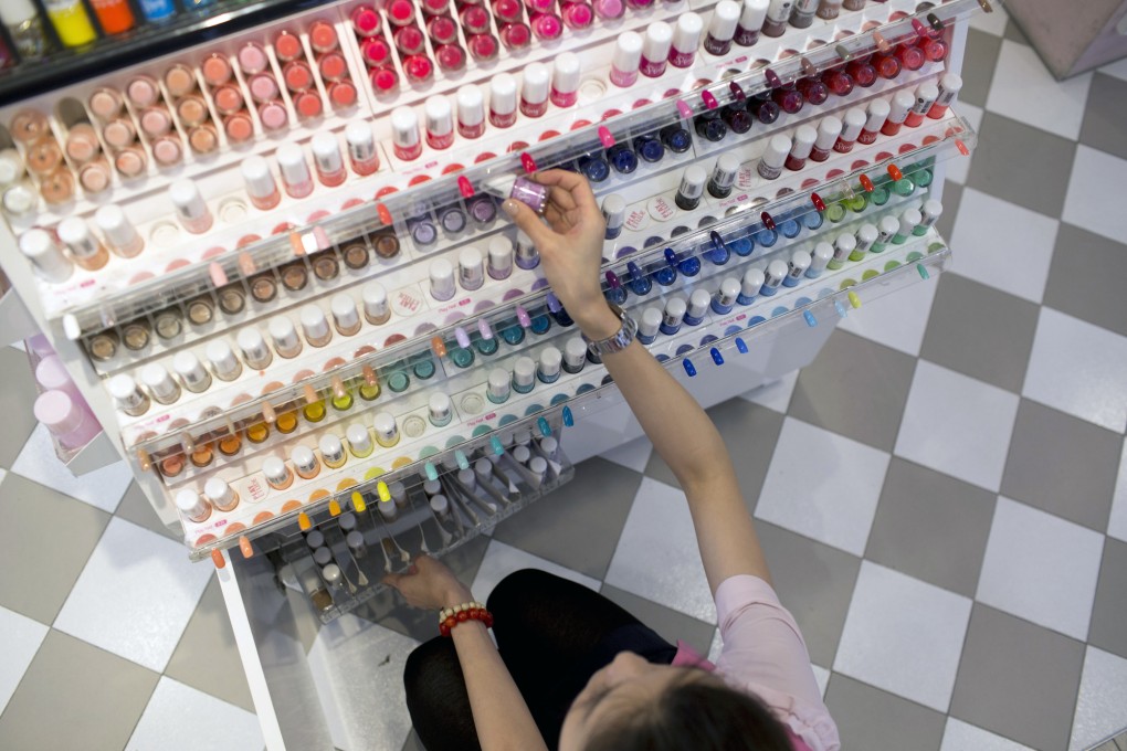 Shop assistants need to know enough English for simple sales talk. Photo: Bloomberg