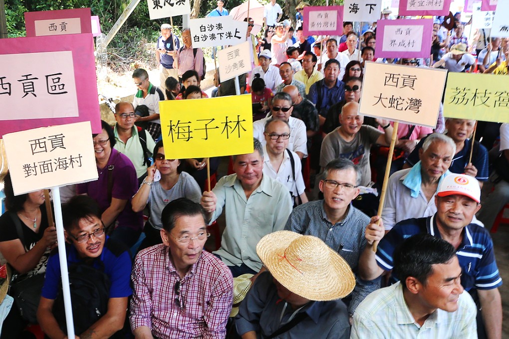 Residents of the north Lantau villages of Pak Mong, Tai Ho and Ngau Kwu Long protest against a new zoning plan that would protect 4.6 hectares of land in the 230-hectare Tai Ho valley and estuary as a site of special scientific interest. Photo: David Wong