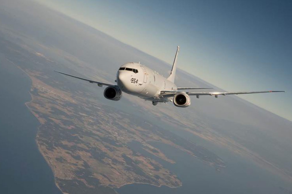 US Navy claims a Chinese J-11B fighter jet engaged in dangerous antics as one of its P-8 Poseidon surveillance planes (above) was on a routine mission 220km east of Hainan Island.