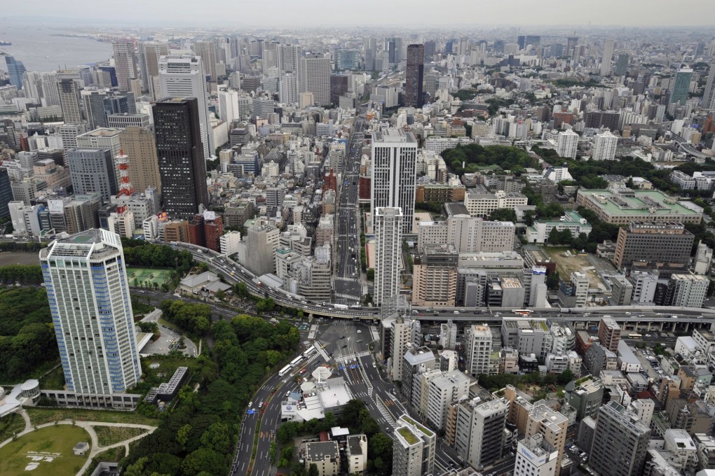 Protesters in Hong Kong step on paper replicas of the Japanese imperial flag  last September 18 to mark the 82nd anniversary of the Mukden Incident,  which led to Japan’s conquest of the former Manchuria, now called Shenyang. Photo: Edward Wong