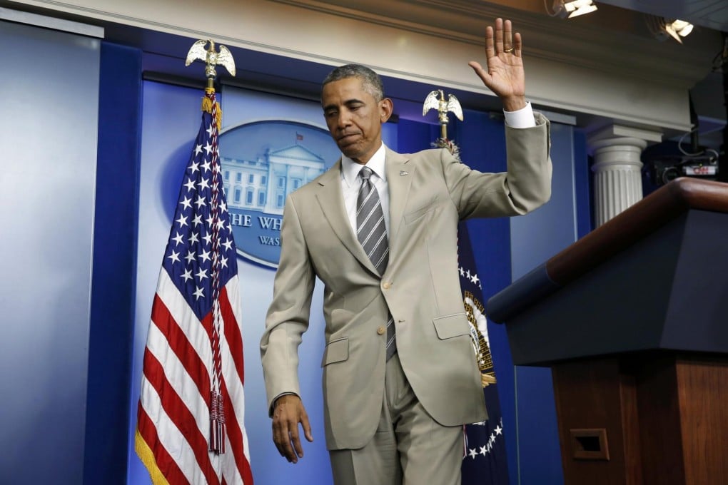 The president's decision to address the media in a summer suit became a focus for many. Photo: Reuters