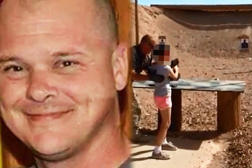 Shooting instructor Charles Vacca stands next to a 9-year-old girl at the Last Stop shooting range in White Hills. He was accidentally shot and killed by the girl with a Uzi gun when the weapon's strong recoil caused her to lose control of her aim. Photo: Reuters