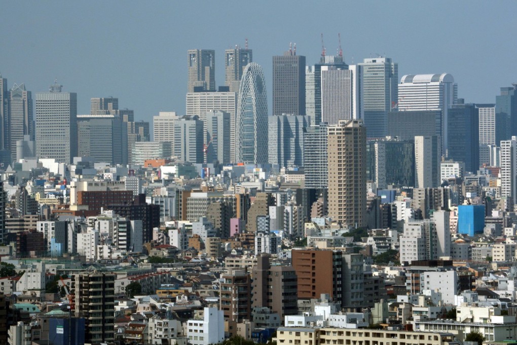 Japan's new JPX-Nikkei Index 400 aims to stoke the economy by
ranking companies on profit measures such as return on equity and market value. Photo: AFP