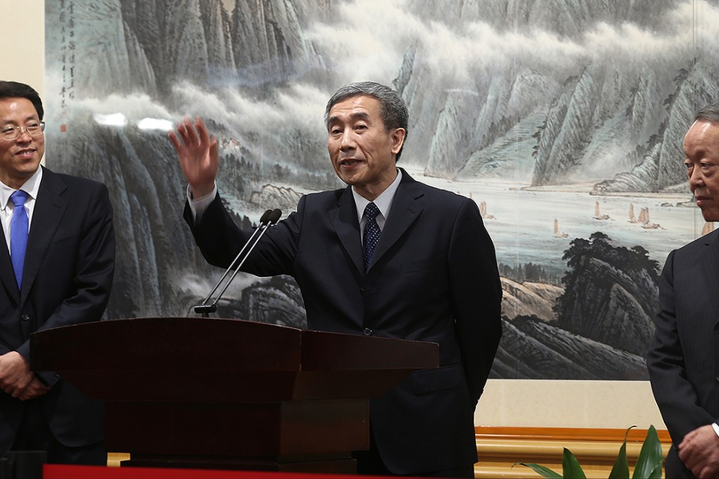 Director of the Liaison Office of the Central People's Government in the HKSAR Zhang Xiaoming, Basic Law Committee chairman Li Fei, HKMAO director Wang Guangya, meet the media after a meeting to discuss political reform in Shenzhen. Photo: K. Y. Cheng