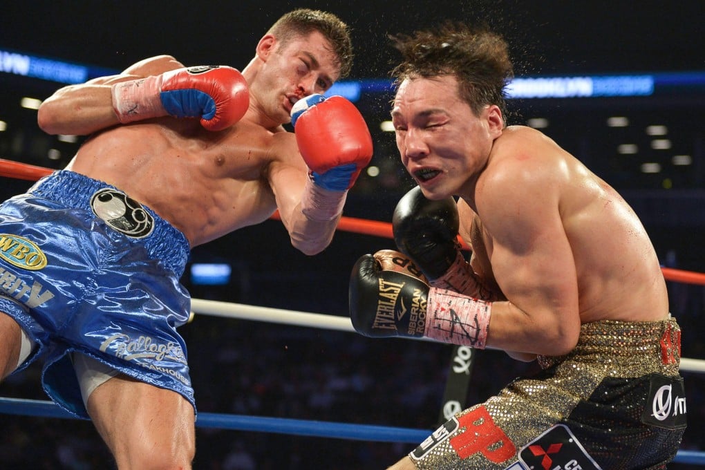 Chris Algieri lands a punch against Ruslan Provodnikov on the way to lifting the WBO junior welterweight title belt in June. Photo: Rich Villa