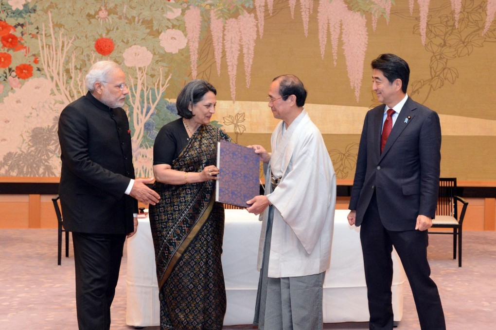 Narendra Modi, Indian ambassador Deepa Gopalan Wadhwa, Kyoto mayor Kadokawa Daisaku and Shinzo Abe yesterday. Photo: AFP