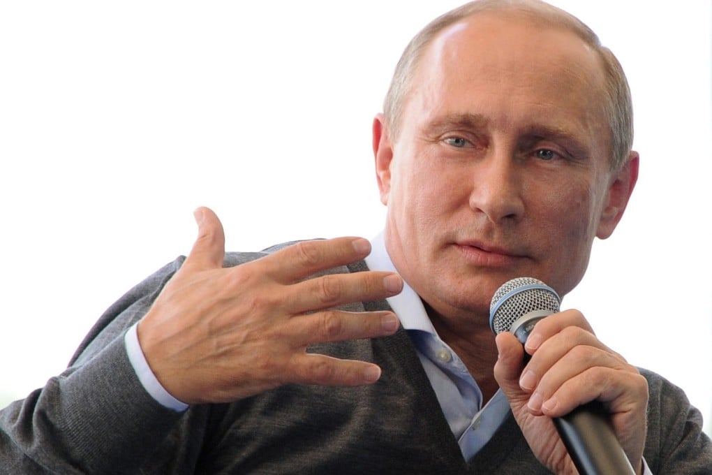 Hours after US President Barack Obama accused Russia of sending troops into Ukraine, Russian President Vladimir Putin retorted that the Ukrainian army was the villain of the piece. Photo: EPA