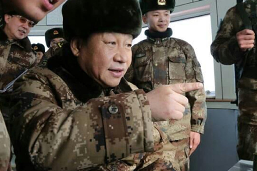 President Xi Jinping, outfitted with the new military uniform, visits troops stationed on the China-Mongolia border in January. Photo: Xinhua