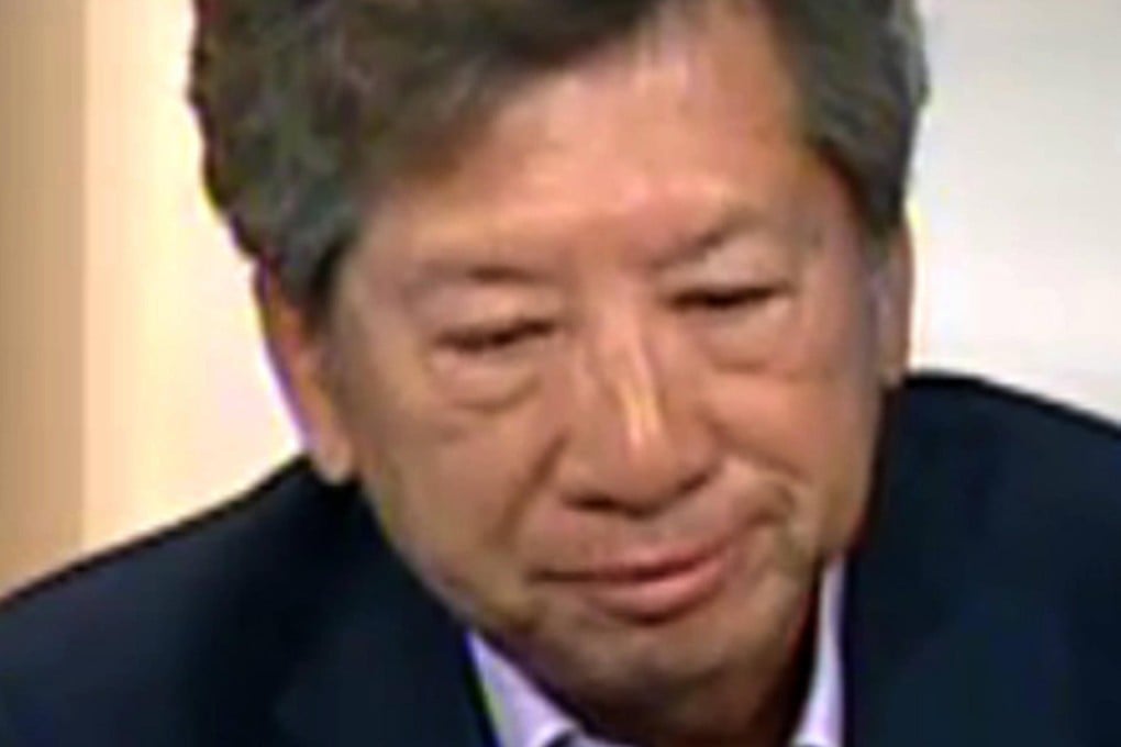 Ronny Tong cries on a live Cable TV programme yesterday.