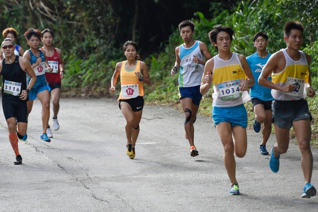 Talented Hong Kong runner Christy Yiu (centre) breaks her own course record in the 14th Chung Hing Cup in Tsuen Wan. Photo: Richard Castka