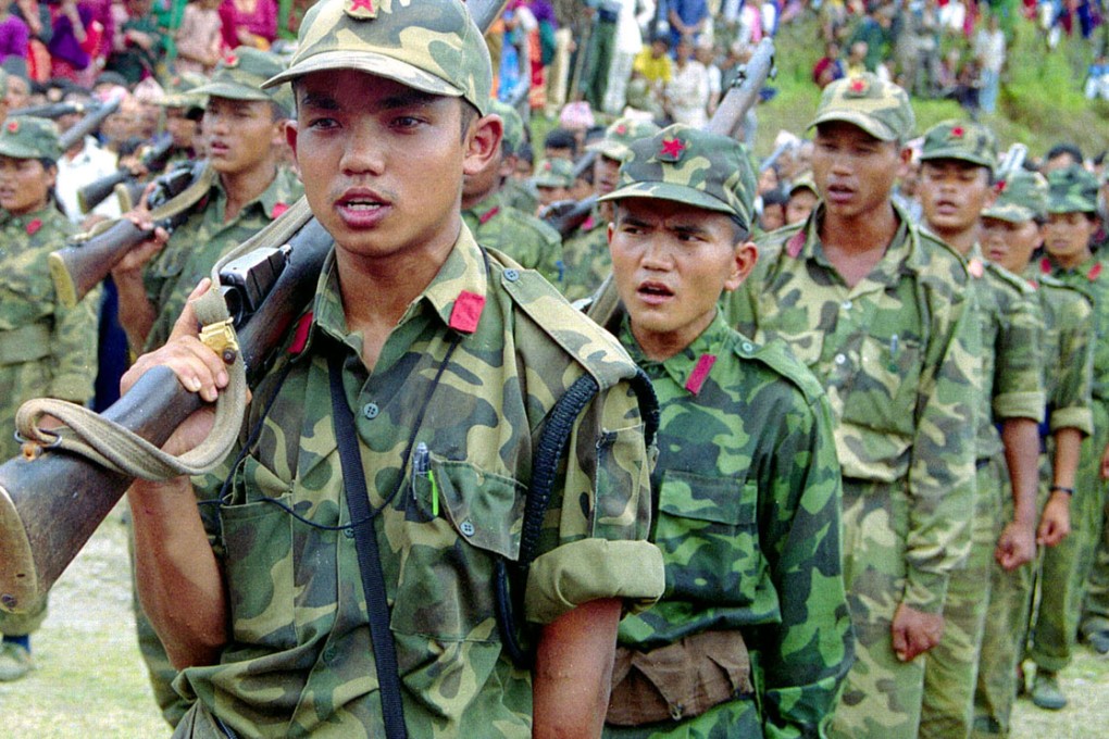 Young Nepalese Maoist rebels take part in a ceremony in the village of Dolkha, about 200 km east of Kathmandu. Photo: Reuters