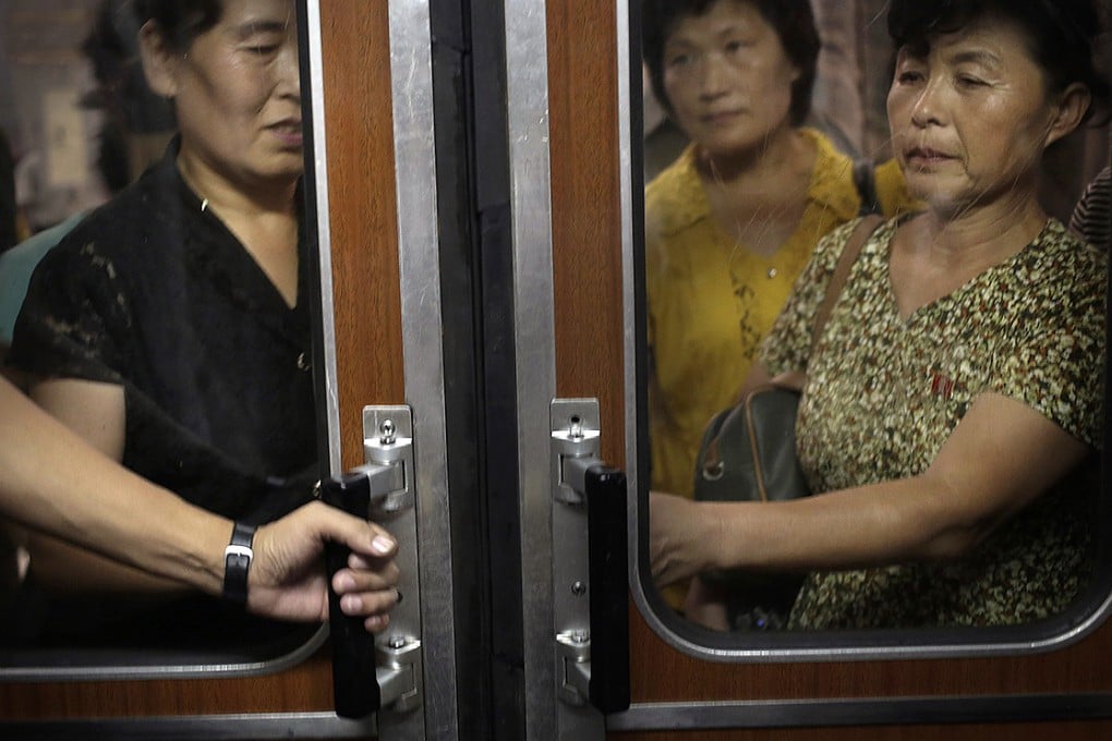 North Korean commuters wait to a subway in Pyongyang. Photo: AP