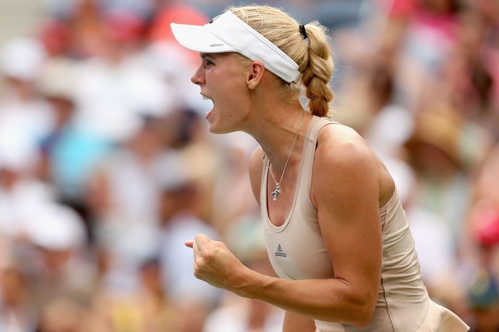 Caroline Wozniacki celebrates her win. Photo: AFP