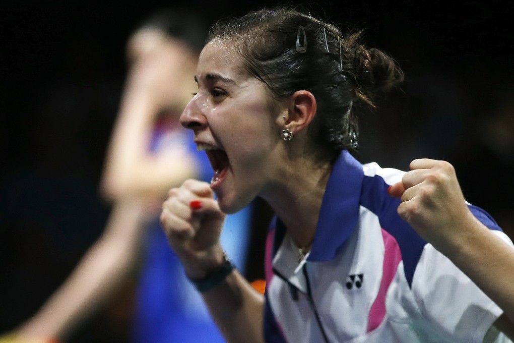 Carolina Marin of Spain cannot believe she has just beaten China's Li Xuerui to become world champion. Photo: Xinhua