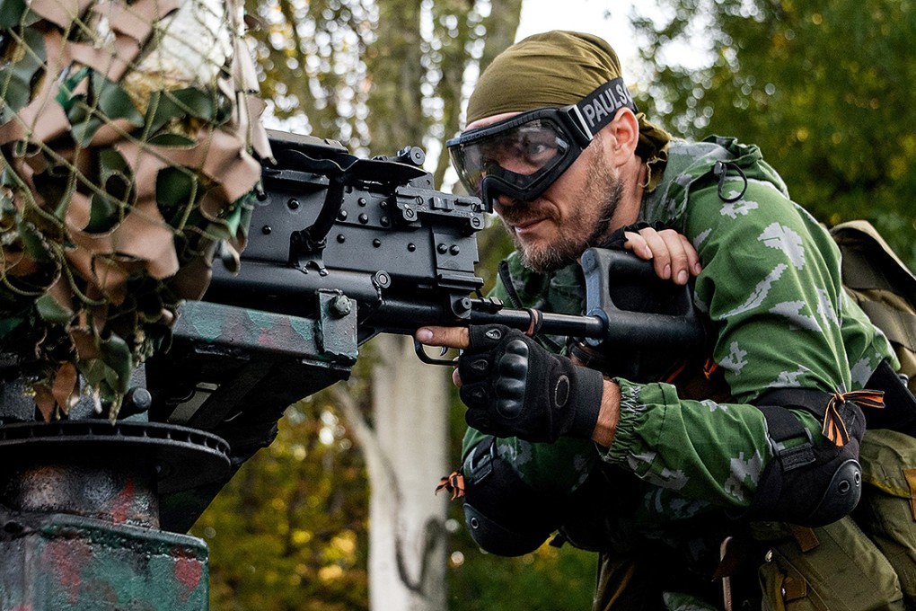 A pro-Russian rebel prepares for an assault on Ukrainian positions around Donetsk airport. Photo: AP
