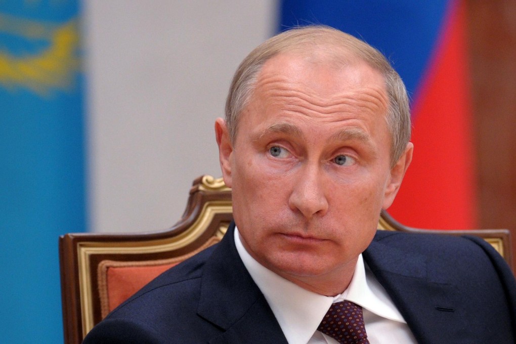 Vladimir Putin had talks with Jose Manuel Barroso. Photo: AFP