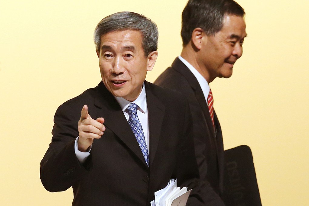 Chief Executive Leung Chun-ying and Li Fei attend the AsiaWorld-Expo briefing on the electoral framework yesterday. Photo: Sam Tsang