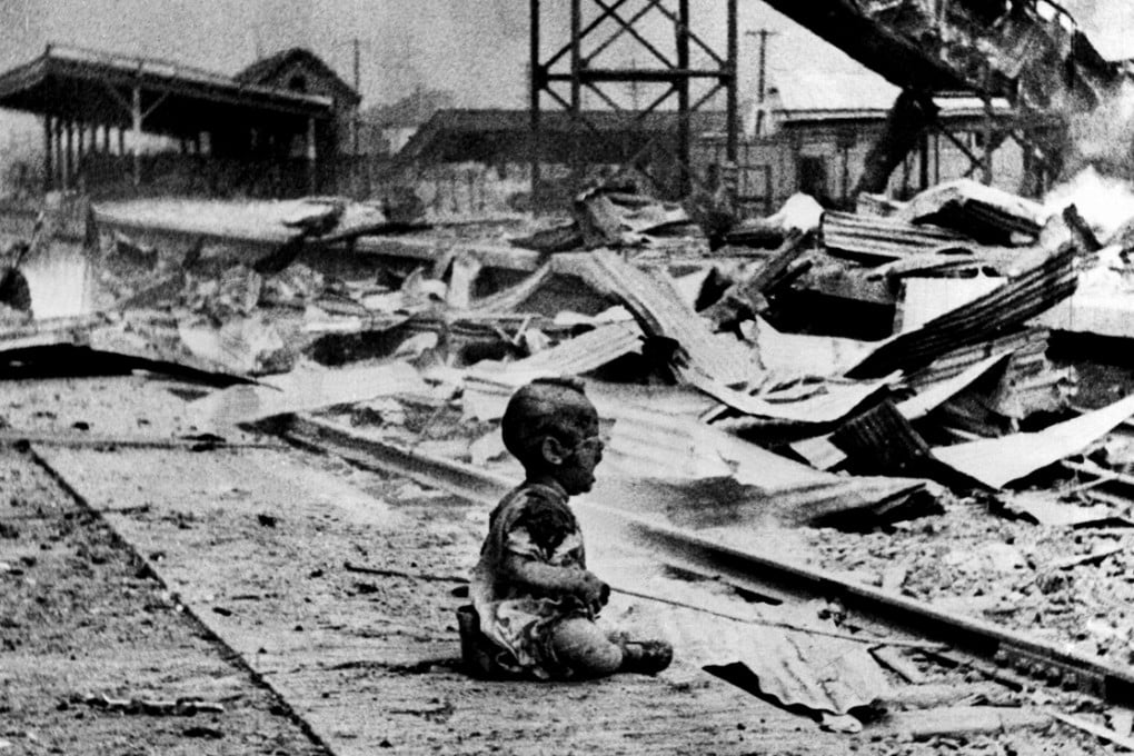 A child cries amid the devastation of a bombing raid on Shanghai during the second Sino-Japanese war. Photo: AP