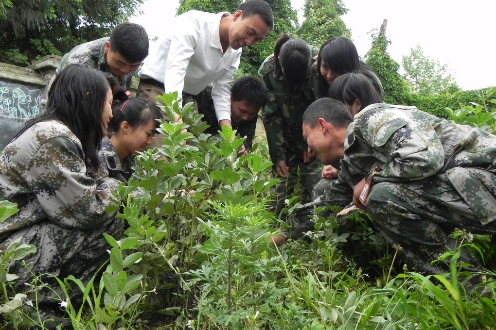 Yang Changhong (centre) leads students in a gardening class.