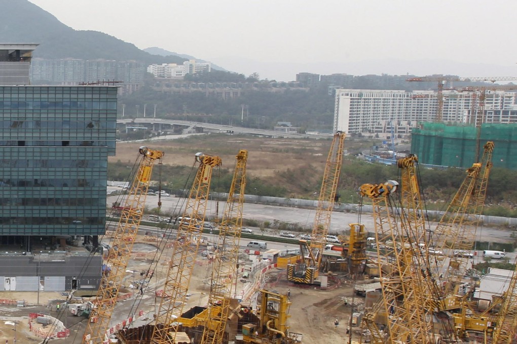 A decision on a controversial plan to build flats on a site earmarked for the Hong Kong Science Park's expansion was put on hold yesterday by the Town Planning Board.